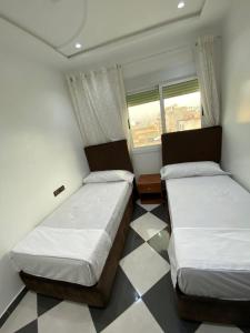 Postel nebo postele na pokoji v ubytování Dina Apartments