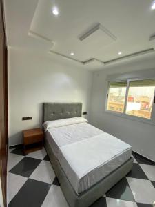 Postel nebo postele na pokoji v ubytování Dina Apartments