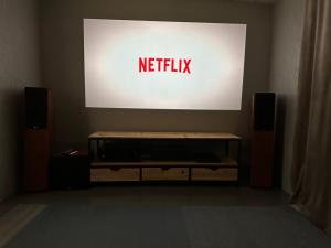 a netflix sign on a wall in a room at Panga Sauna Hut in Lähtru