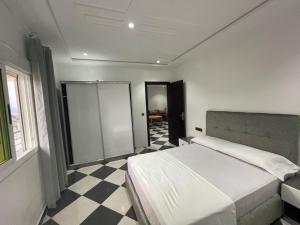 Postel nebo postele na pokoji v ubytování Dina Apartments