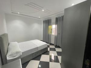 Postel nebo postele na pokoji v ubytování Dina Apartments