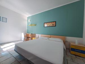 Postel nebo postele na pokoji v ubytování Guest House Matteo