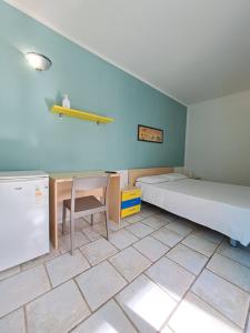 Postel nebo postele na pokoji v ubytování Guest House Matteo