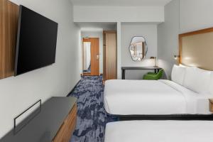 Postel nebo postele na pokoji v ubytování Fairfield Inn & Suites Austin Downtown