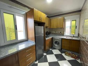 Kuchyň nebo kuchyňský kout v ubytování Dina Apartments