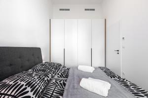Posteľ alebo postele v izbe v ubytovaní Modern Oasis in Bratislava's Heaven