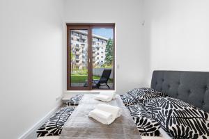 Posteľ alebo postele v izbe v ubytovaní Modern Oasis in Bratislava's Heaven