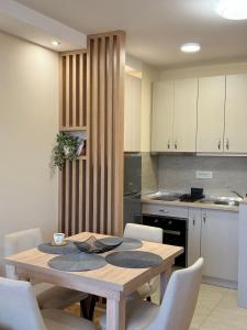 Η κουζίνα ή μικρή κουζίνα στο Apartman Dream LUX & SPA - Vila Matis
