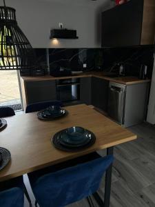 Kuchyň nebo kuchyňský kout v ubytování Pokoje I Apartamenty Polna 19