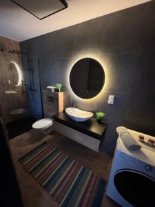 Koupelna v ubytování Pokoje I Apartamenty Polna 19