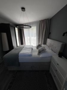 Postel nebo postele na pokoji v ubytování Pokoje I Apartamenty Polna 19