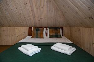 Postel nebo postele na pokoji v ubytování Porto Resort