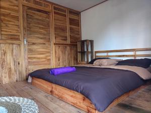Postel nebo postele na pokoji v ubytování Batur Twin house