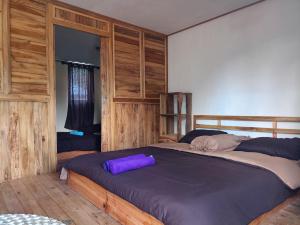 Postel nebo postele na pokoji v ubytování Batur Twin house