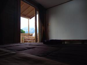 Postel nebo postele na pokoji v ubytování Batur Twin house