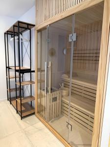 a room with a glass enclosure with some bunk beds at Bordeaux cosy home in Bordeaux