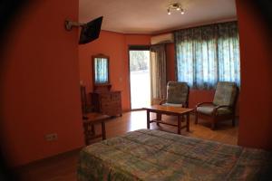 TV a/nebo společenská místnost v ubytování Hotel Las Nieves
