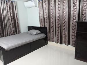Katil atau katil-katil dalam bilik di Penthouse in Sylhet
