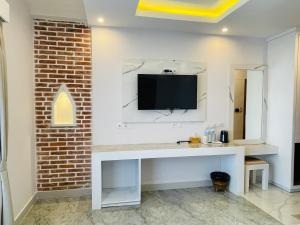 TV a/nebo společenská místnost v ubytování Hotel Matina Suites