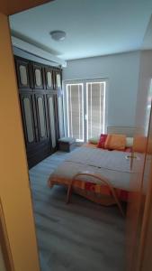 Postel nebo postele na pokoji v ubytování Apartman Maja