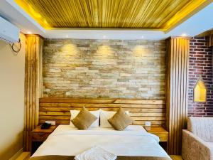 Postel nebo postele na pokoji v ubytování Hotel Matina Suites