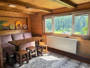Posezení v ubytování Guest House Kaspiy