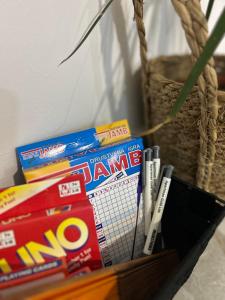 a box of toothpaste and toothbrushes on a table at Apartman Gold LUX in Surčin +15 photos