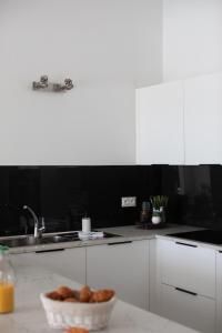 Kuchyň nebo kuchyňský kout v ubytování Villa Moai