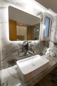 Koupelna v ubytování Hotel Philoxenia