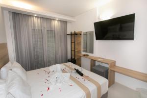 TV a/nebo společenská místnost v ubytování Hotel Philoxenia