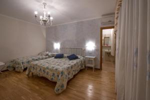 Ένα ή περισσότερα κρεβάτια σε δωμάτιο στο Cecco di Nara