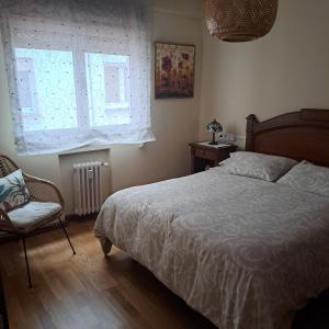 Postel nebo postele na pokoji v ubytování Centro Caveda, wifi, posibilidad de parking