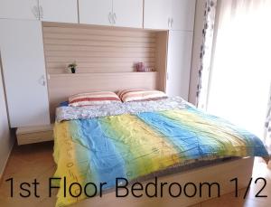 a bedroom with a first floor bedroom at Leos Villa in Tragjas +9 photos