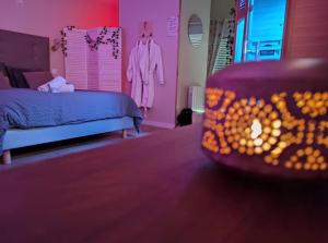 Posteľ alebo postele v izbe v ubytovaní Le Cocoon d'Emy + 5 fotografií