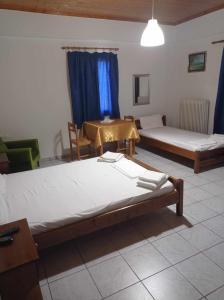 Postel nebo postele na pokoji v ubytování Το Πέρασμα