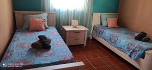 Letto o letti in una camera di 3 Bedrooms Apartment