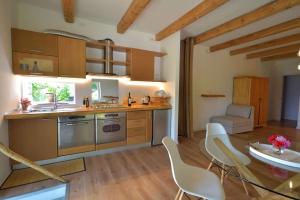Kuchyň nebo kuchyňský kout v ubytování Shambala Home Loft Sole + 58 fotografií