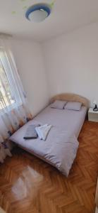 Postel nebo postele na pokoji v ubytování Apartman Lila