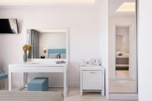 Postel nebo postele na pokoji v ubytování Melina Bay Boutique Hotel