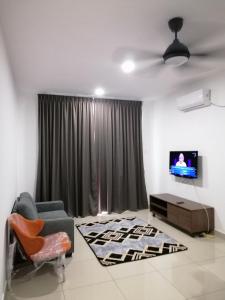 Μια τηλεόραση ή/και κέντρο ψυχαγωγίας στο Homestay Syamsul +8 φωτογραφίες