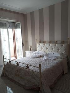 Postel nebo postele na pokoji v ubytování A Casa di Mich