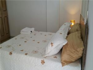 Letto o letti in una camera di Hospedaje solymar III Sarie Bay