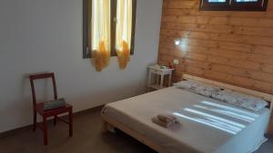 Postel nebo postele na pokoji v ubytování b&b Onda Verde