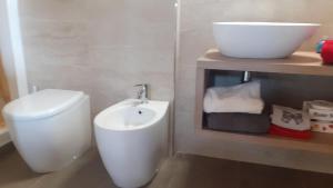 Koupelna v ubytování b&b Onda Verde