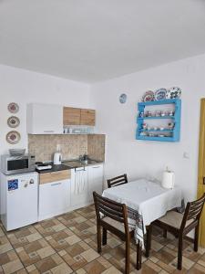 Kuchyň nebo kuchyňský kout v ubytování Apartmany Detvanka
