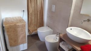 Koupelna v ubytování b&b Onda Verde