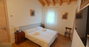 Postel nebo postele na pokoji v ubytování Casa Vilma