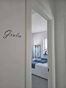 Postel nebo postele na pokoji v ubytování Il Portico B&B Capri