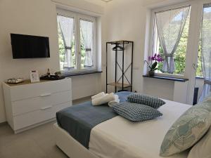 Postel nebo postele na pokoji v ubytování Il Portico B&B Capri