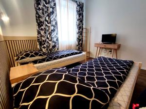 Posteľ alebo postele v izbe v ubytovaní Och!hostel
